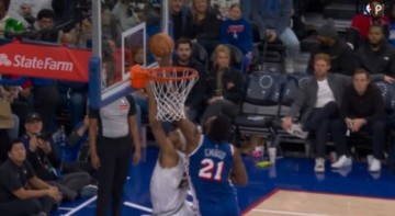 这也行？恩比德明显干扰球裁判没吹 好像还动手拉纳吉球衣了